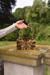 THE BROWN BUTTERFLY BAG