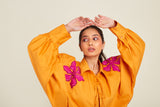 Baggy shirt with applique flowers and front knots